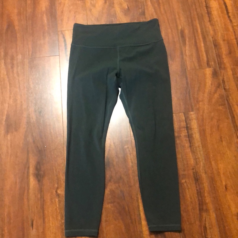 ATHLETA 7/8 elation tights black olive color